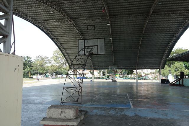 Inside (or underneath) the sheltered basketball court of Banga Municipal Park, commonly called "The Plaza", between Quezon Avenue and Roxas Street in Banga, South Cotabato, Philipp