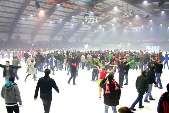 Celebrating crowd in the Tivoli ice stadium after the Ice hockey competition Uni-Cup 2009 of the University Sports Centre of Aachen University for the ThyssenKrupp-Trophy , Aachen,
