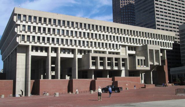 The fourth and current Boston City Hall , located at 1 City Hall Square in Government Center , Boston , Massachusetts , opened in 1969 and was designed in the Brutalist style by th