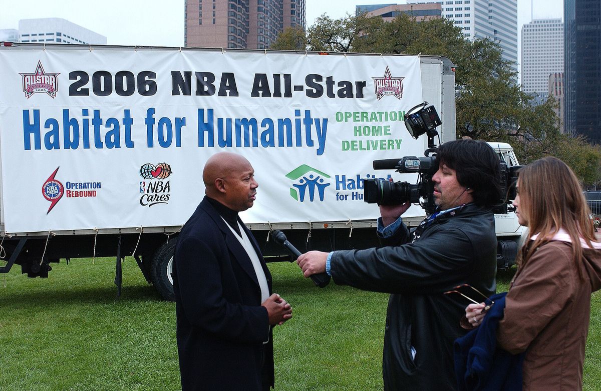 The original finding aid described this photograph as: Event: Secretary Alphonso Jackson at National Basketball Association-Habitat for Humanity Home Build Subject Description: Sec