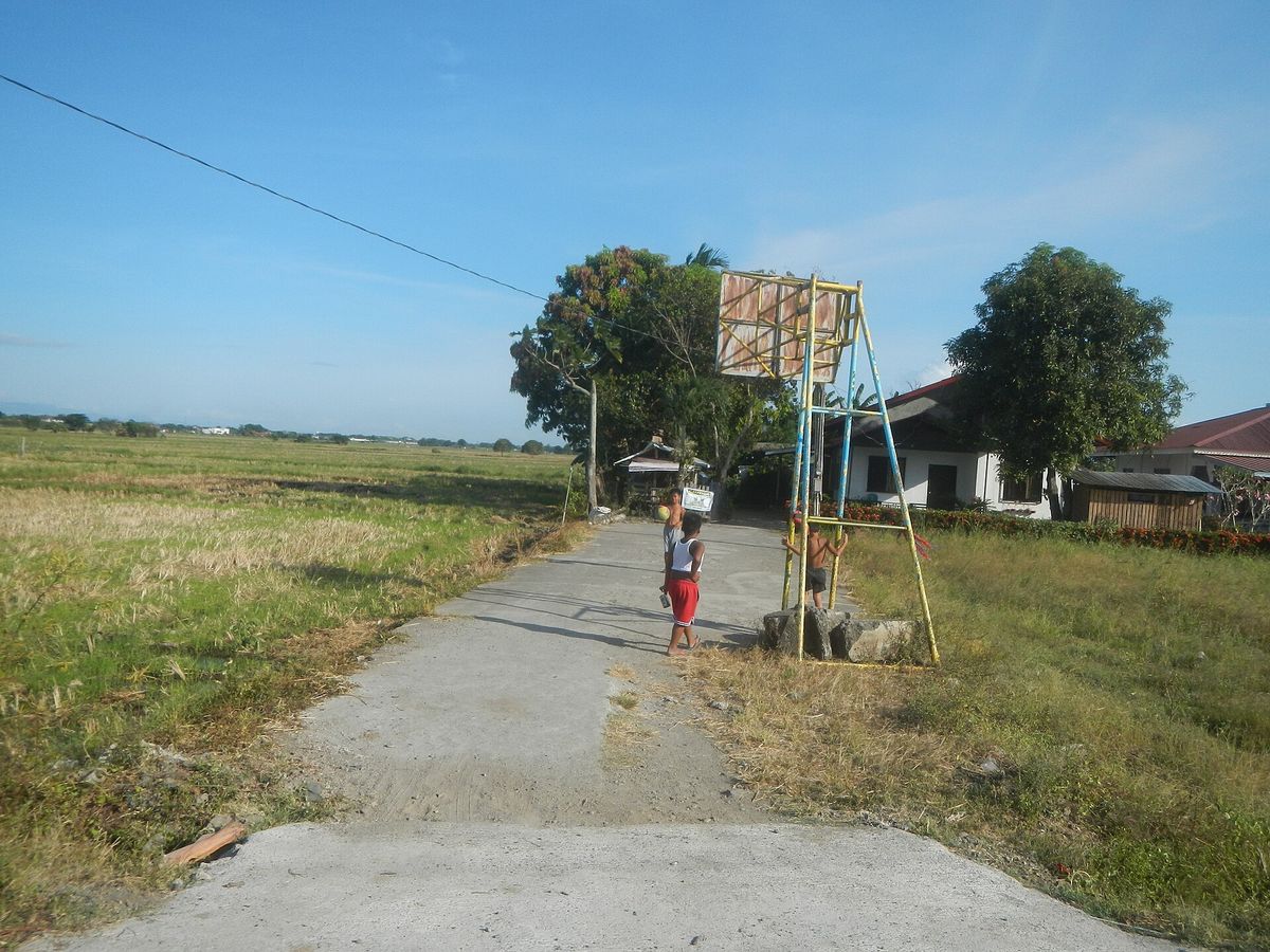 Children playing basketball in the Philippines